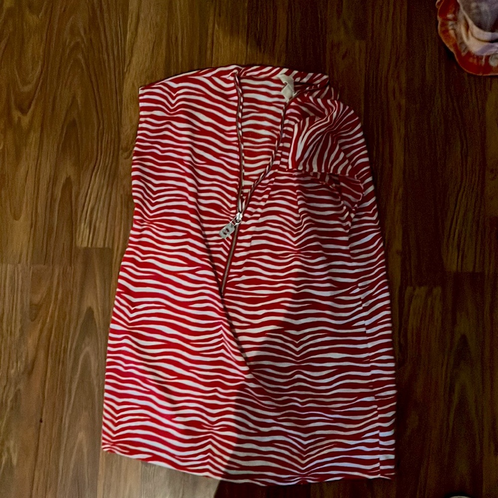 This red and white strip blouse was handed as a gift.